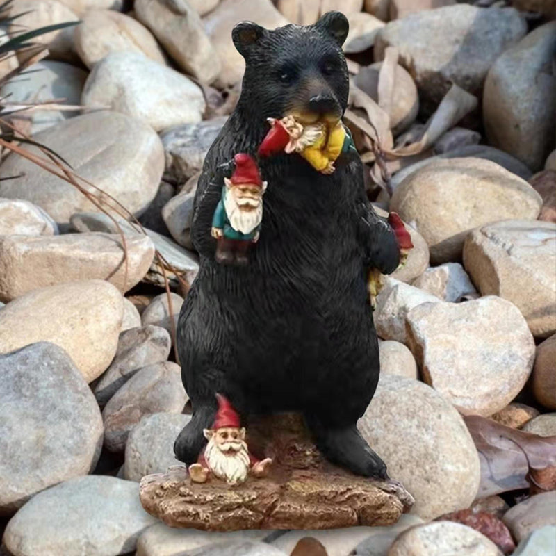 Black bear eating elf desktop ornament