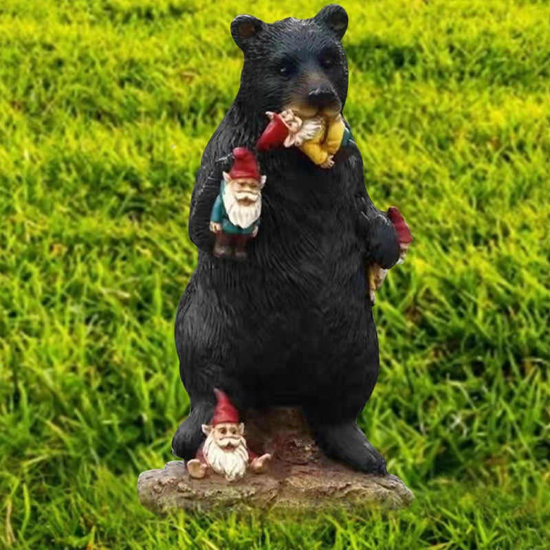 Black bear eating elf desktop ornament