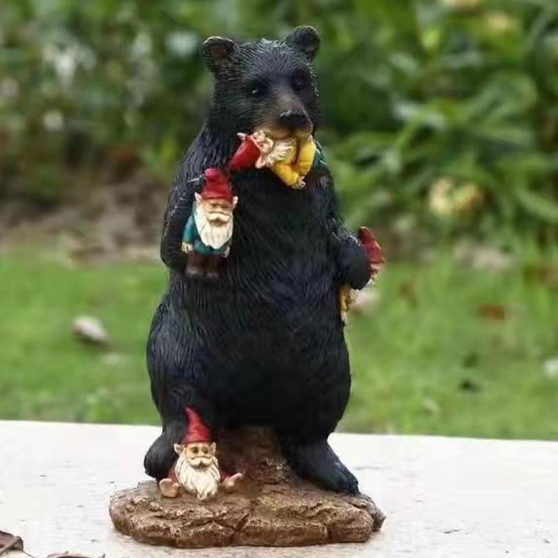Black bear eating elf desktop ornament
